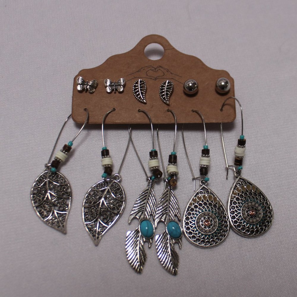 The Studs And Three Dangle Pairs Of Earrings 18$